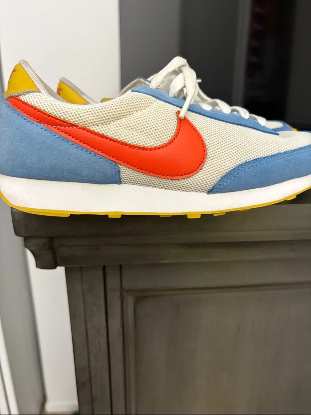Nike Kids White Sneakers with Light Blue Panels and Orange Swoosh